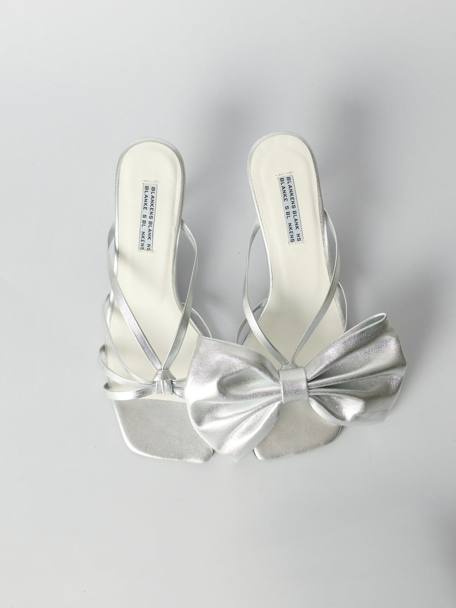Blankens Silver Bow Clip-ons